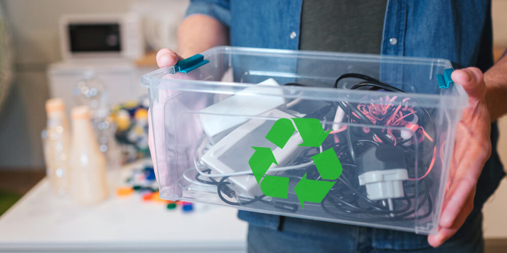 Recycling,Concept.,An,Electronic,Waste,In,Recycling,Contaner,Close-up.,Responsible Why You Should Recycle Your Old Electronics Before An Office Move